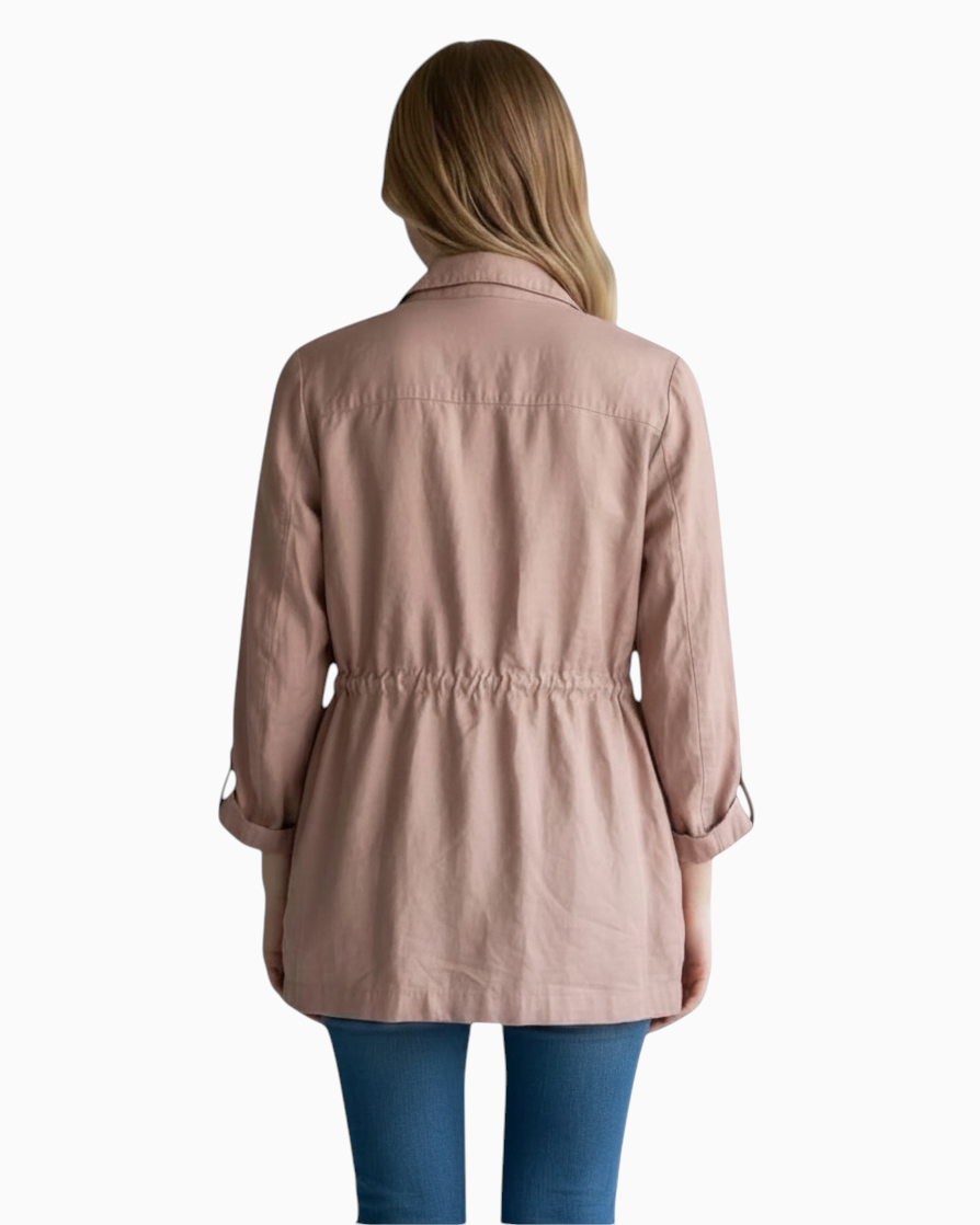 Back view of a woman wearing a Thrift N Gift Zara lightweight dusty pink utility jacket with a drawstring waist.