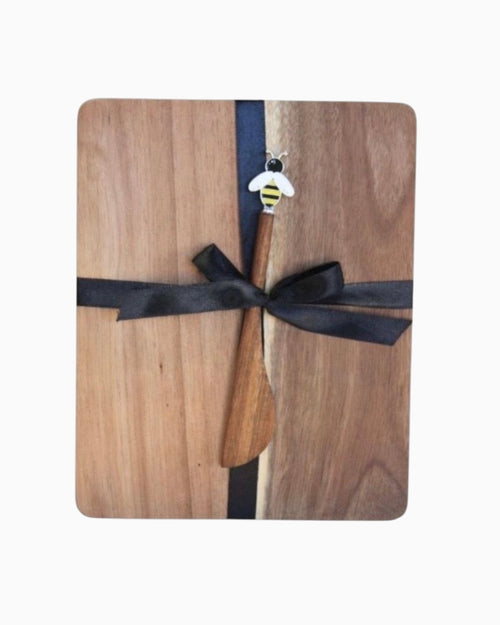 Thrift N Gift acacia wood cheeseboard with a matching wooden bee-themed spreader tied with a black ribbon