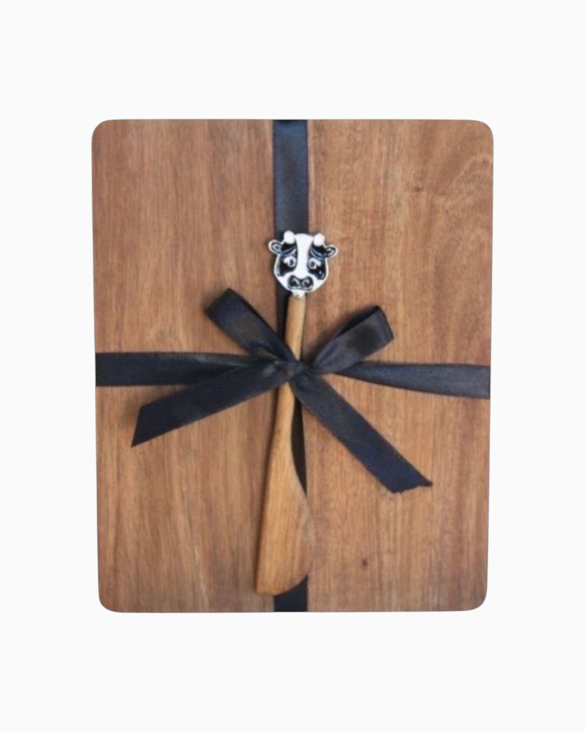 Thrift N Gift acacia wood cheeseboard with a decorative cow-themed spreader tied with a black ribbon gift bow