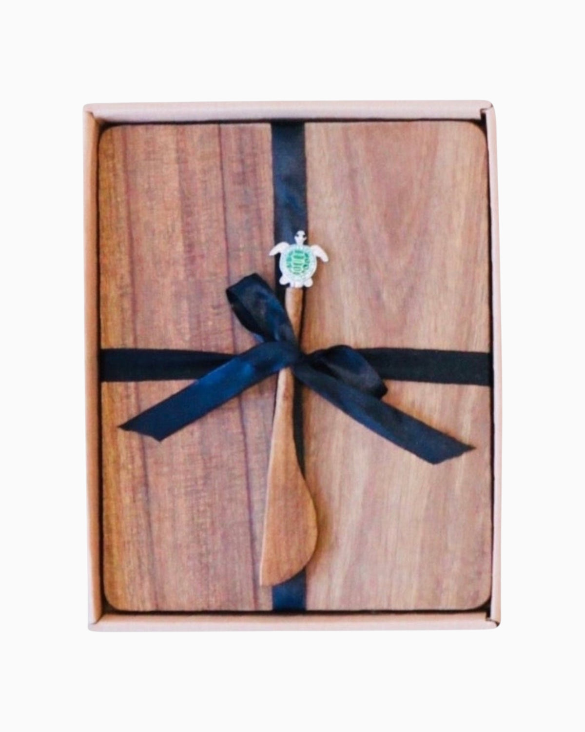 Thrift N Gift acacia wood cheeseboard set with a decorative turtle spreader, tied with a black ribbon in a gift box.
