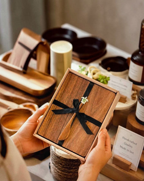 Thrift N Gift acacia wood cheeseboard and turtle spreader gift set in a presentation box with a black ribbon