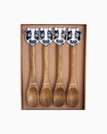Thrift N Gift set of four acacia wood spoons with decorative black and white cow handles in a gift box