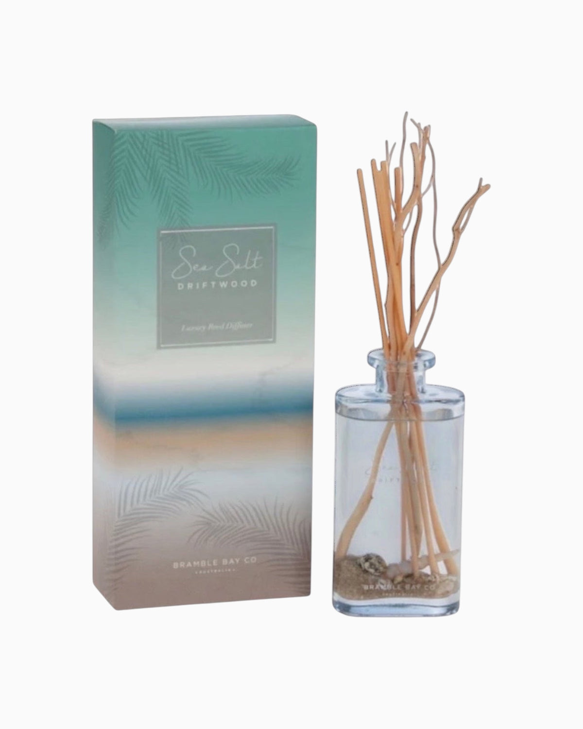 Thrift N Gift Bramble Bay Sea Salt and Driftwood reed diffuser in a glass bottle with sand, shells, and willow sticks