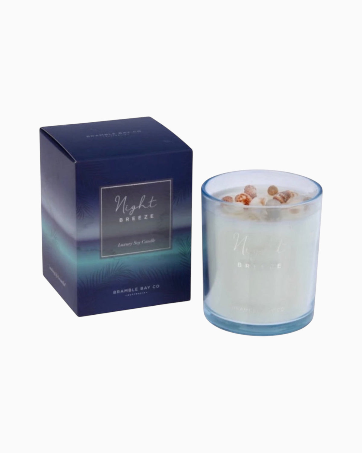 Thrift N Gift Bramble Bay Night Breeze soy candle in an ocean blue glass jar topped with authentic sea shells
