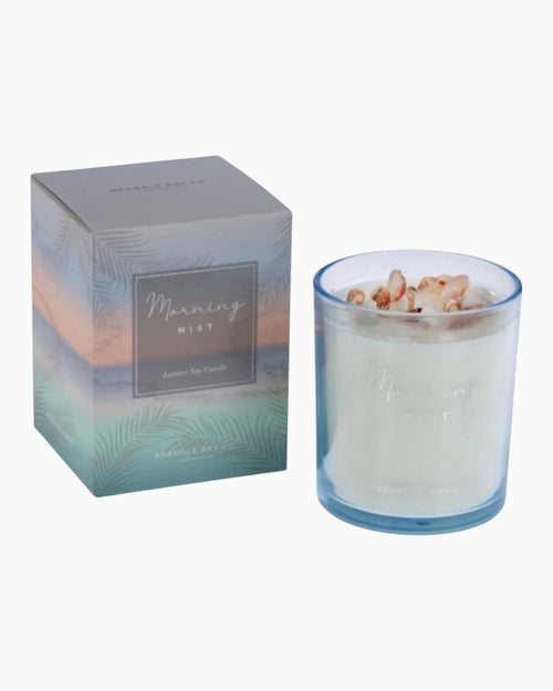 Thrift N Gift Bramble Bay Morning Mist soy candle in an ocean blue glass jar topped with authentic sea shells