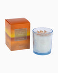 Thrift N Gift Bramble Bay Sunkissed Sands soy candle in an ocean blue glass jar topped with authentic sea shells