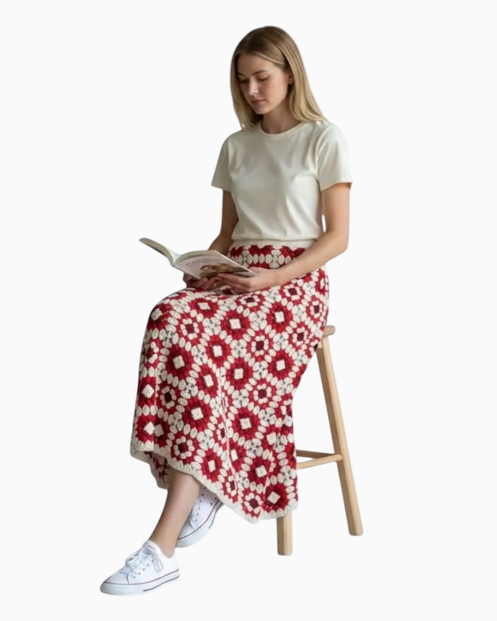 Thrift N Gift Cotton On red and cream crochet granny square boho skirt worn by a woman sitting on a wooden stool