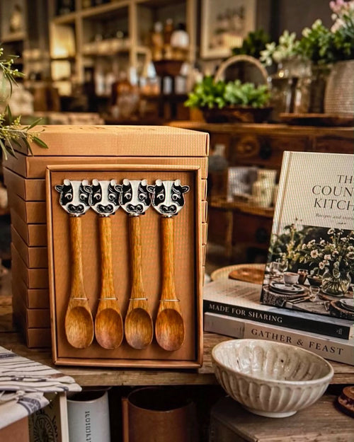 Thrift N Gift set of four wooden spoons with decorative cow-shaped handles in a presentation box