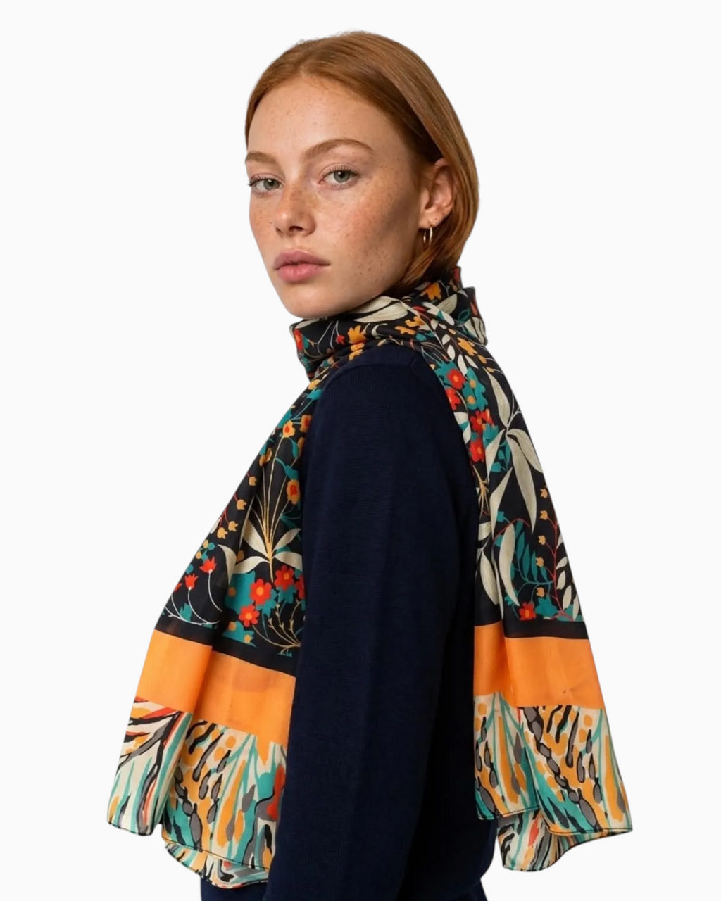 Thrift N Gift lightweight floral scarf with orange, teal, and gold botanical print on a dark base, worn by a model.