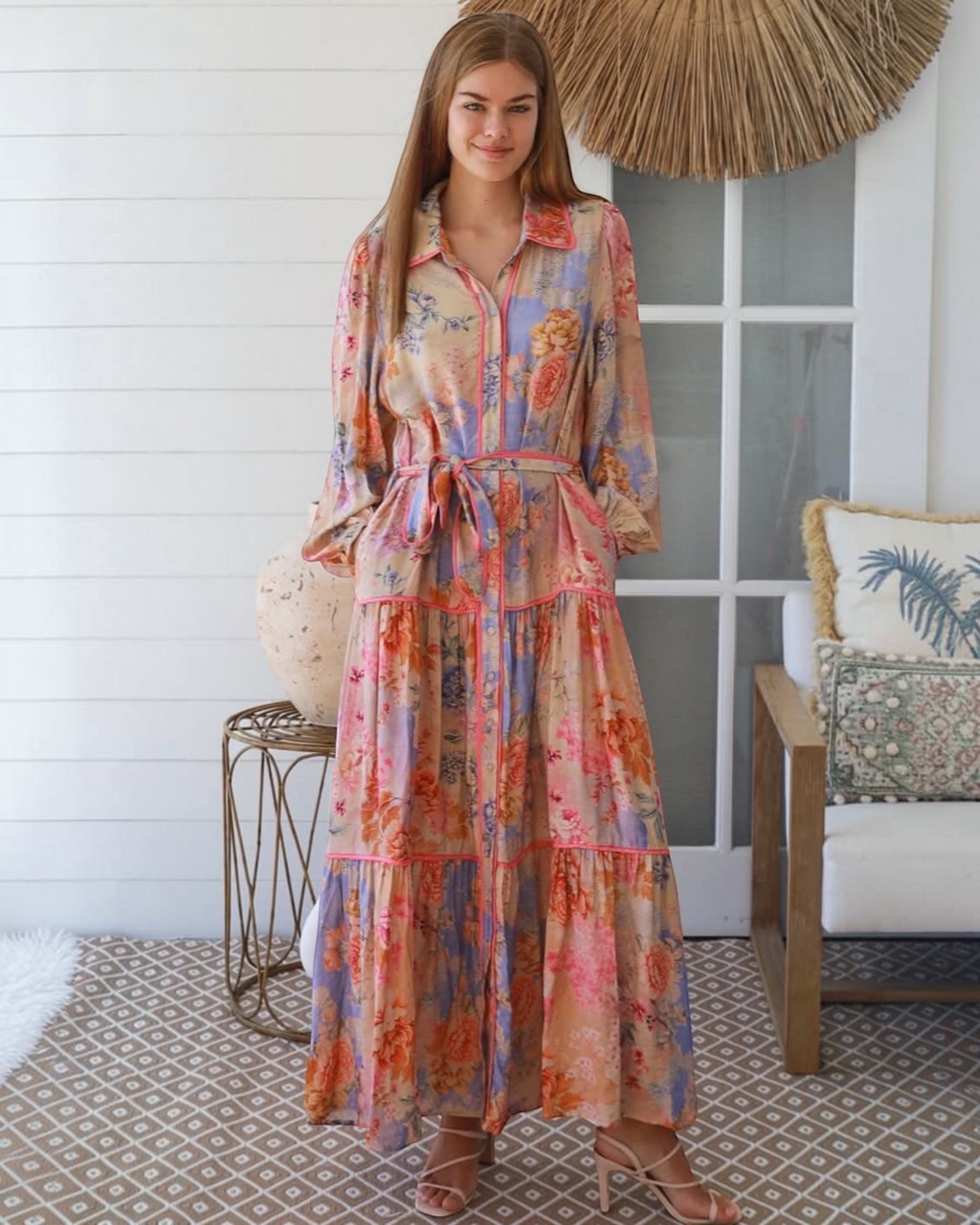 Thrift N Gift floral print button-down maxi dress with long sleeves, tiered skirt, and waist tie in peach and lavender.