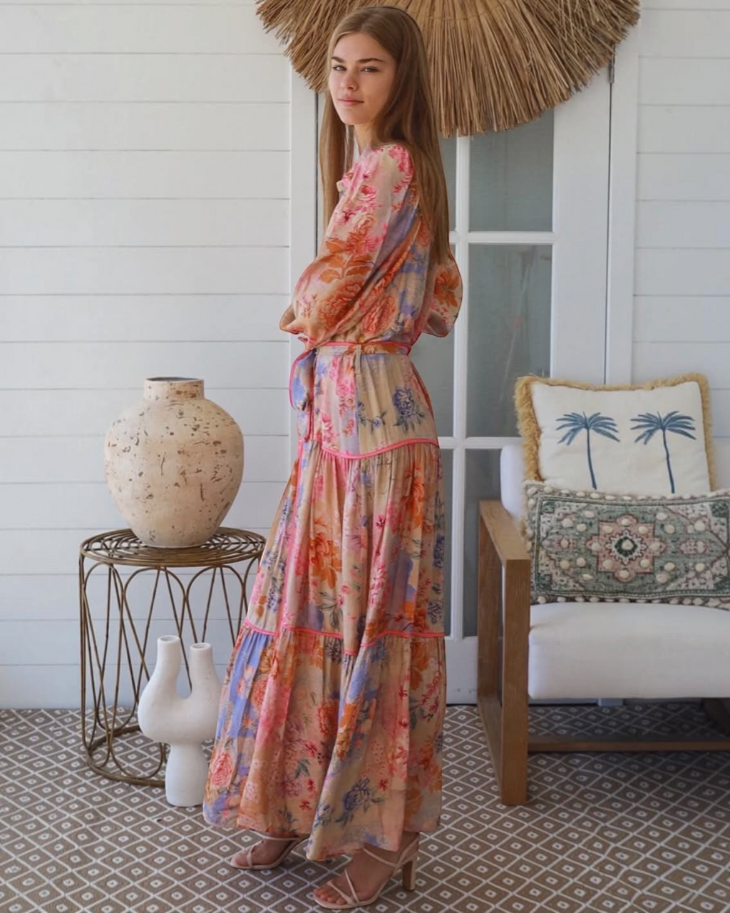 Thrift N Gift floral print maxi dress with long sleeves, button-down front, and tiered skirt in peach and lavender.
