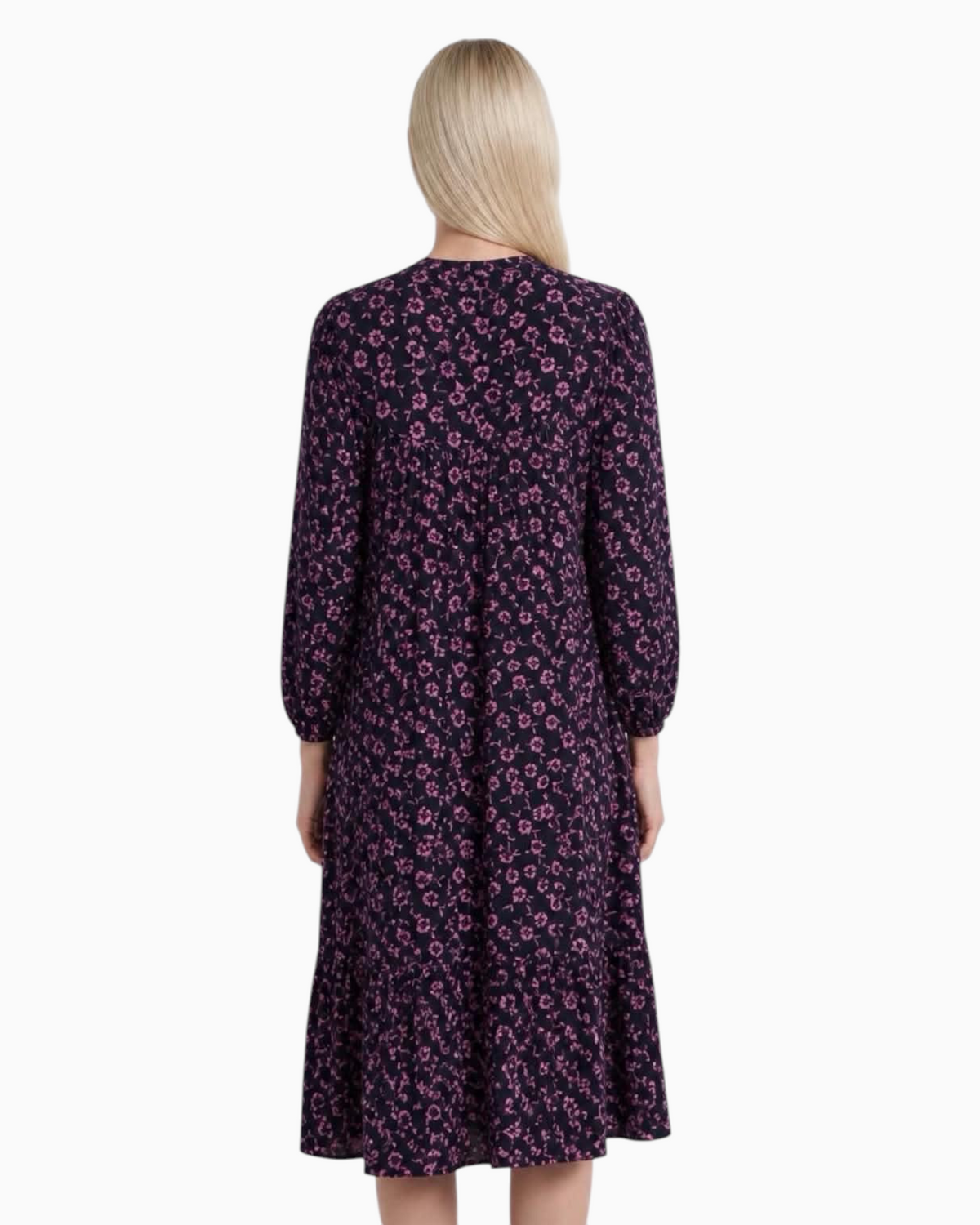 Back view of a Thrift N Gift long sleeve midi dress in black with a vibrant pink floral print and tiered skirt.