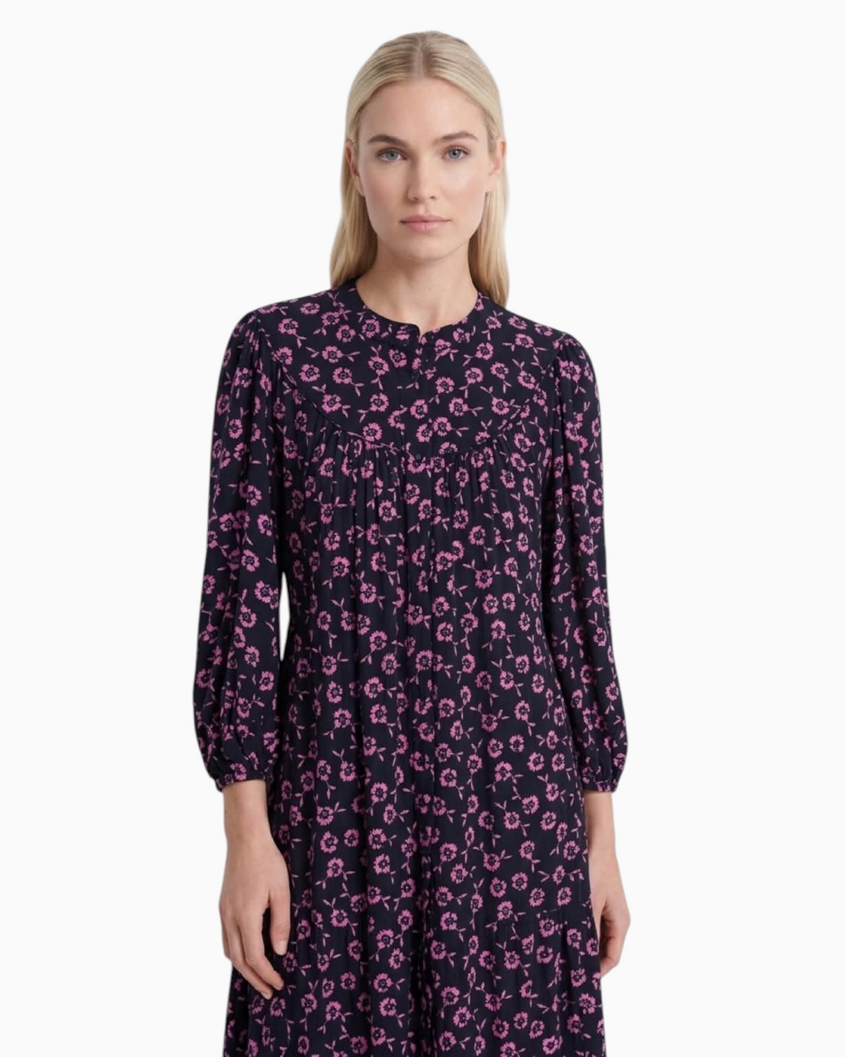 Thrift N Gift long sleeve midi dress in black with a vibrant pink floral print, featuring a round neck and tiered skirt.