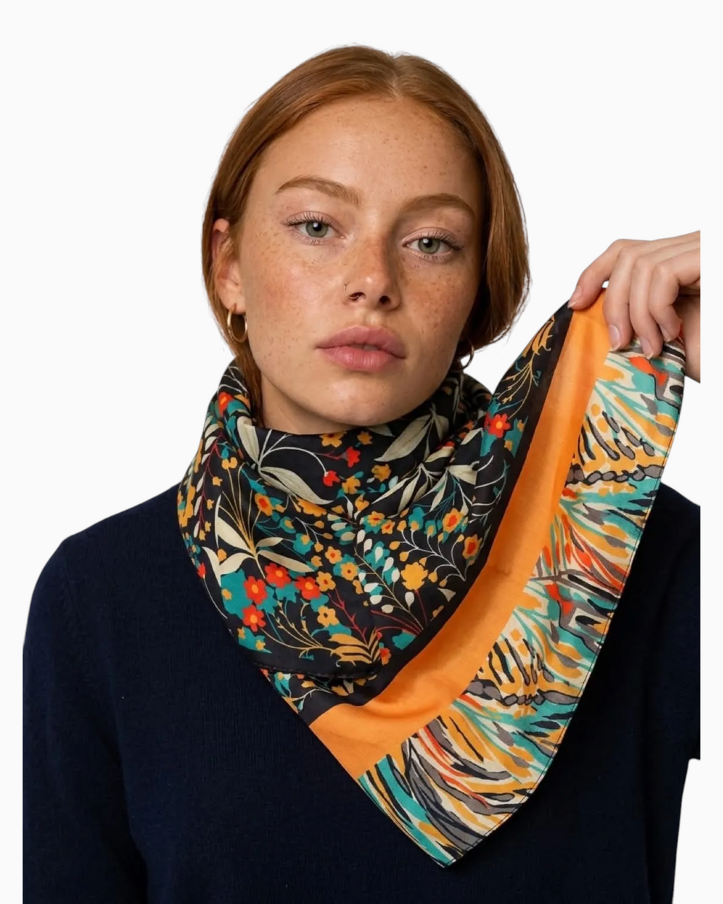 Thrift N Gift lightweight scarf with dark floral print, orange border, and vibrant teal and gold botanical details.