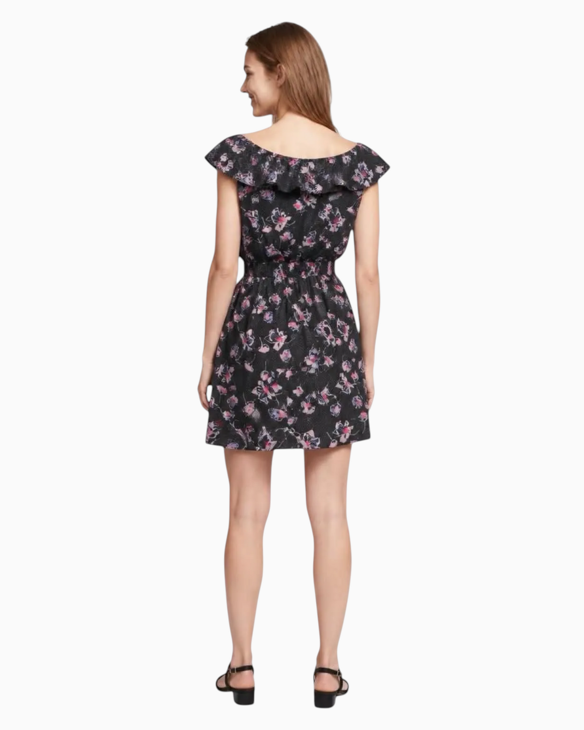 Thrift N Gift floral print mini dress with ruffled shoulders and elasticated waist worn by a model, back view.