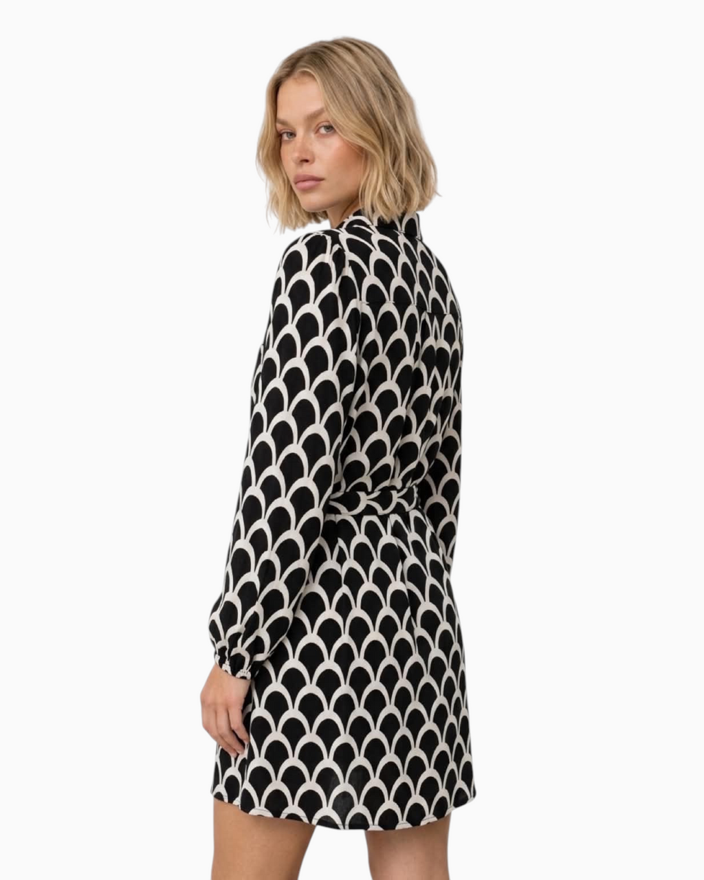 Thrift N Gift long sleeve shirt dress in black and cream geometric fan print with a tie waist on a blonde model
