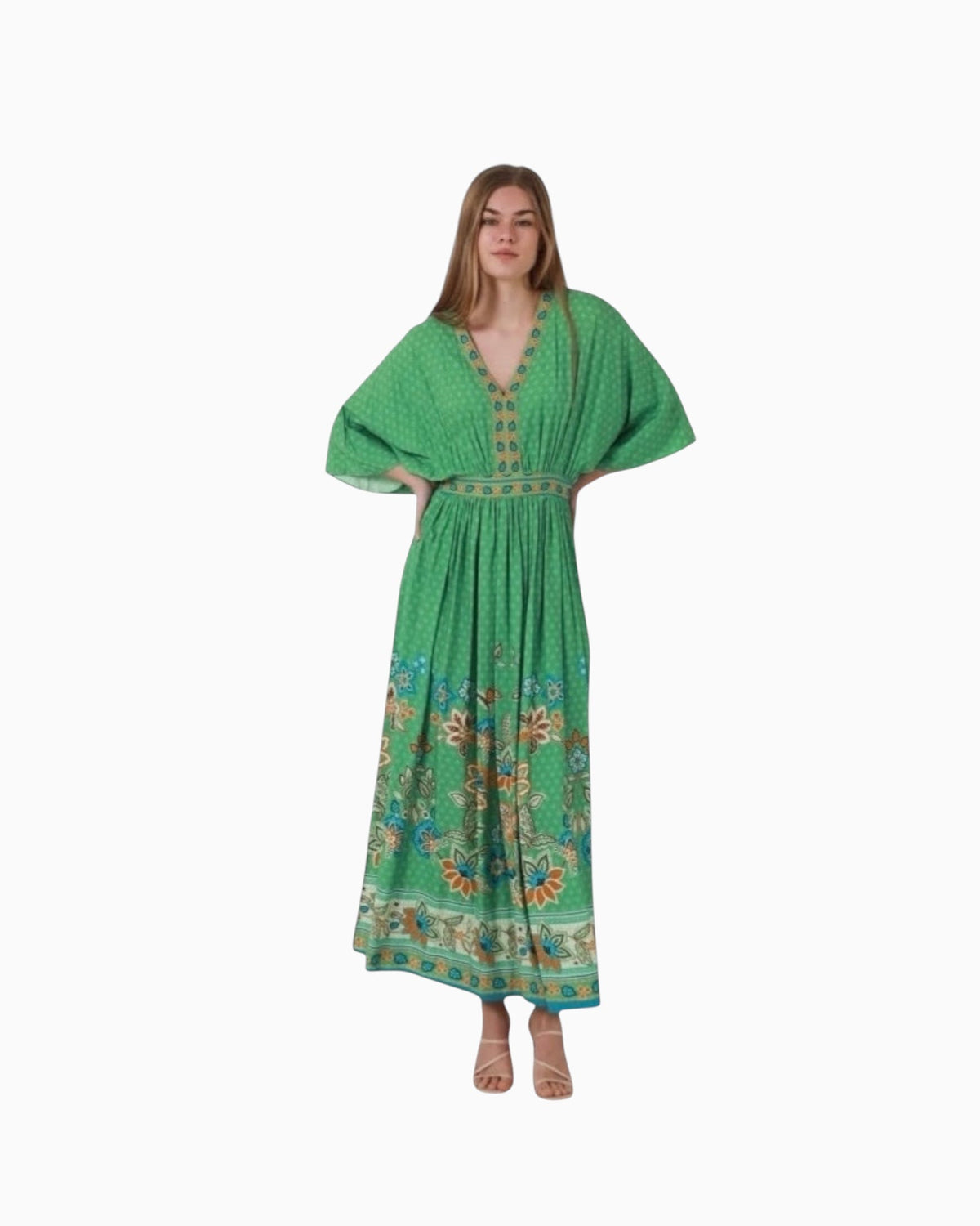 Model wearing a green Dreamcatcher Catalina boho maxi dress with a paisley print and V-neckline.