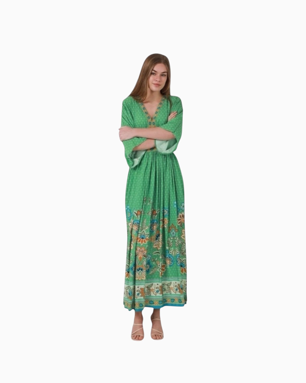 Model wearing a green paisley print boho maxi dress by Thrift N Gift with a V-neckline and soft viscose blend fabric.