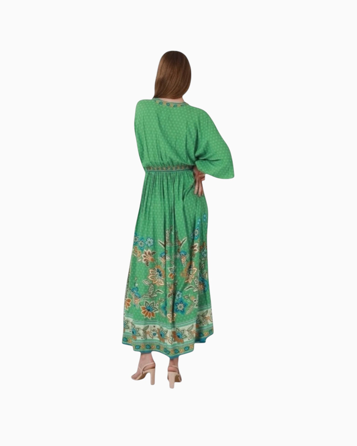 Back view of a woman wearing a green paisley print Dreamcatcher Catalina boho maxi dress with a V-neckline.