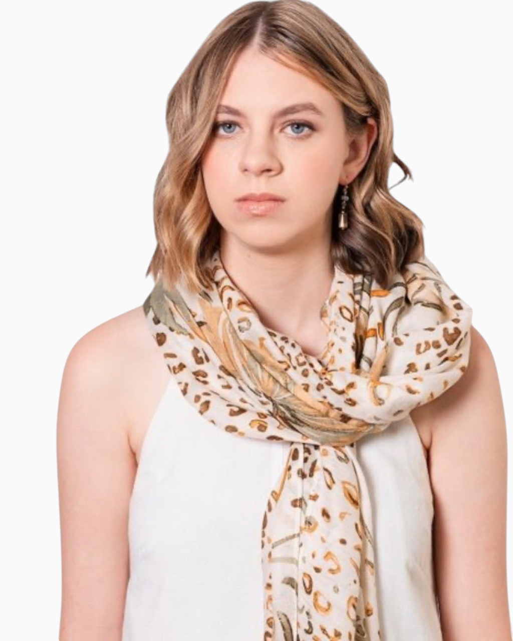 Thrift N Gift lightweight leopard print scarf worn by a woman in a white top against a plain studio background