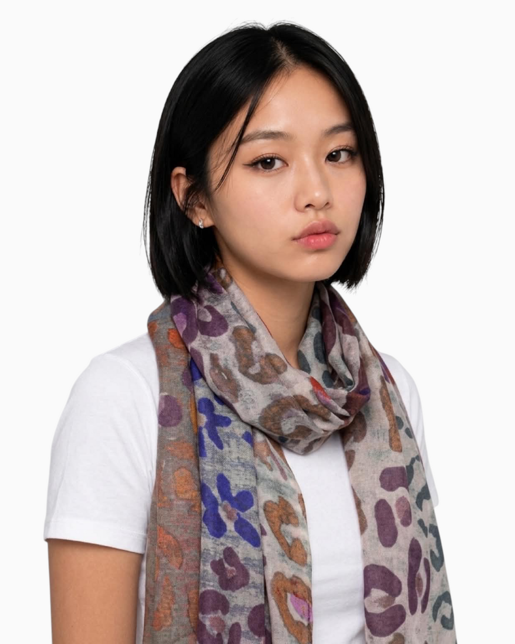 Thrift N Gift lightweight leopard print scarf with purple and blue accents worn by a woman over a white t-shirt