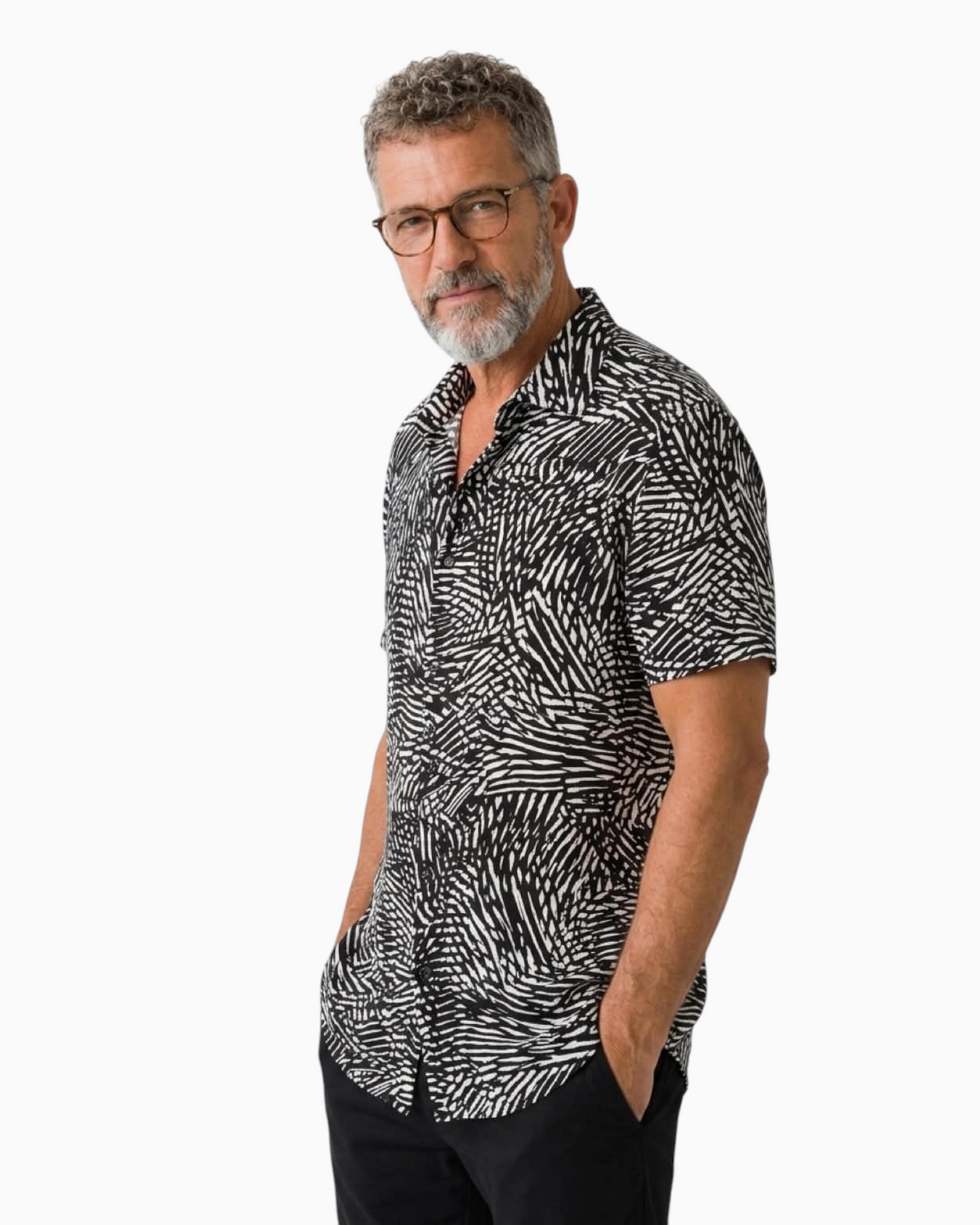 Thrift N Gift men's short sleeve button-down shirt with a black and white abstract graphic print on a model