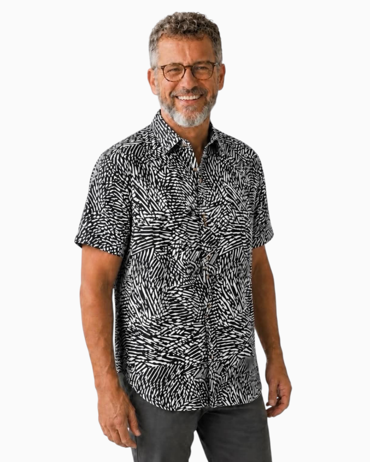 Thrift N Gift men's short-sleeve button-down shirt in a black and white abstract graphic print on a smiling model.