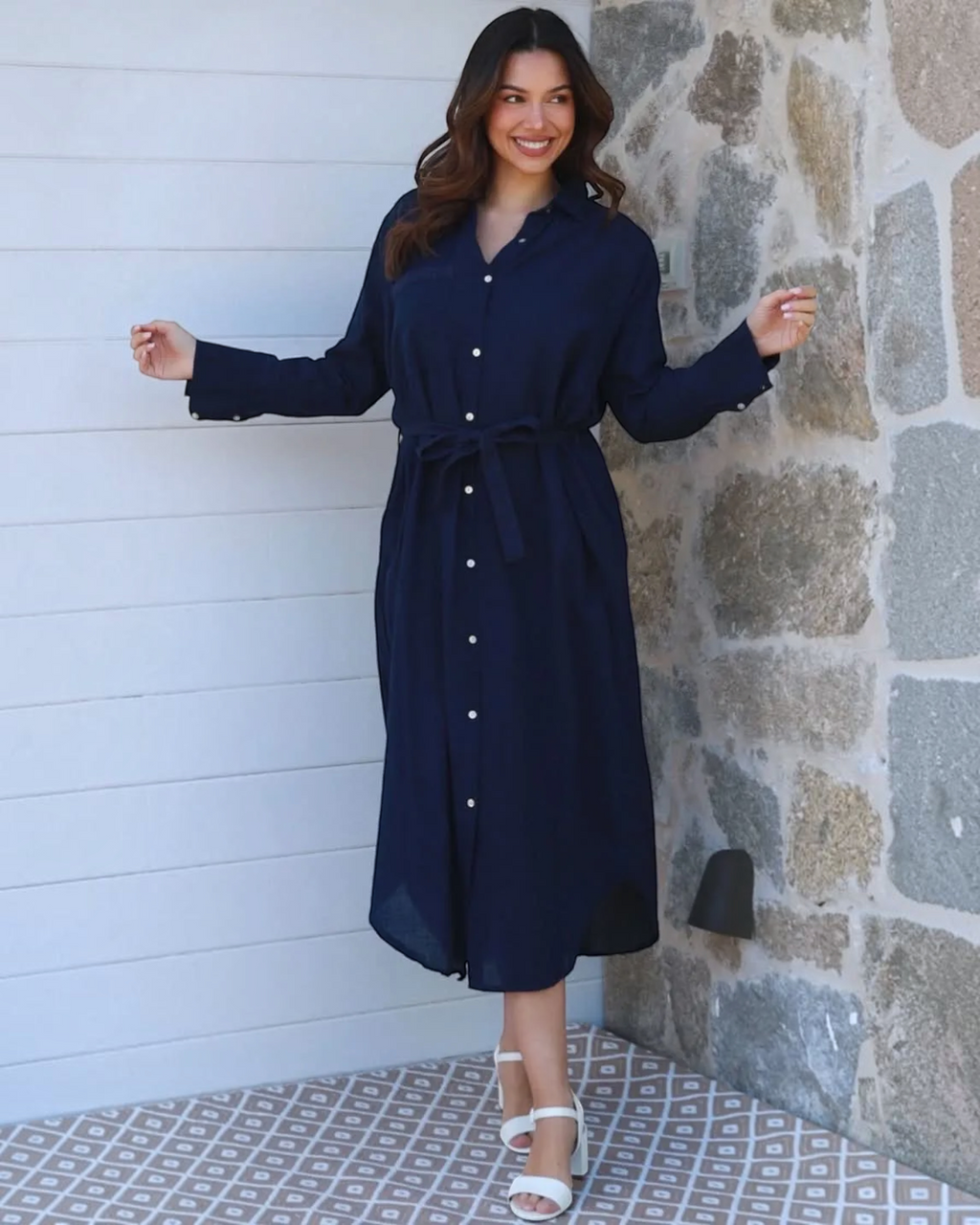 Thrift N Gift navy blue midi shirt dress with long sleeves, button-down front, and tie-waist belt on a smiling model.