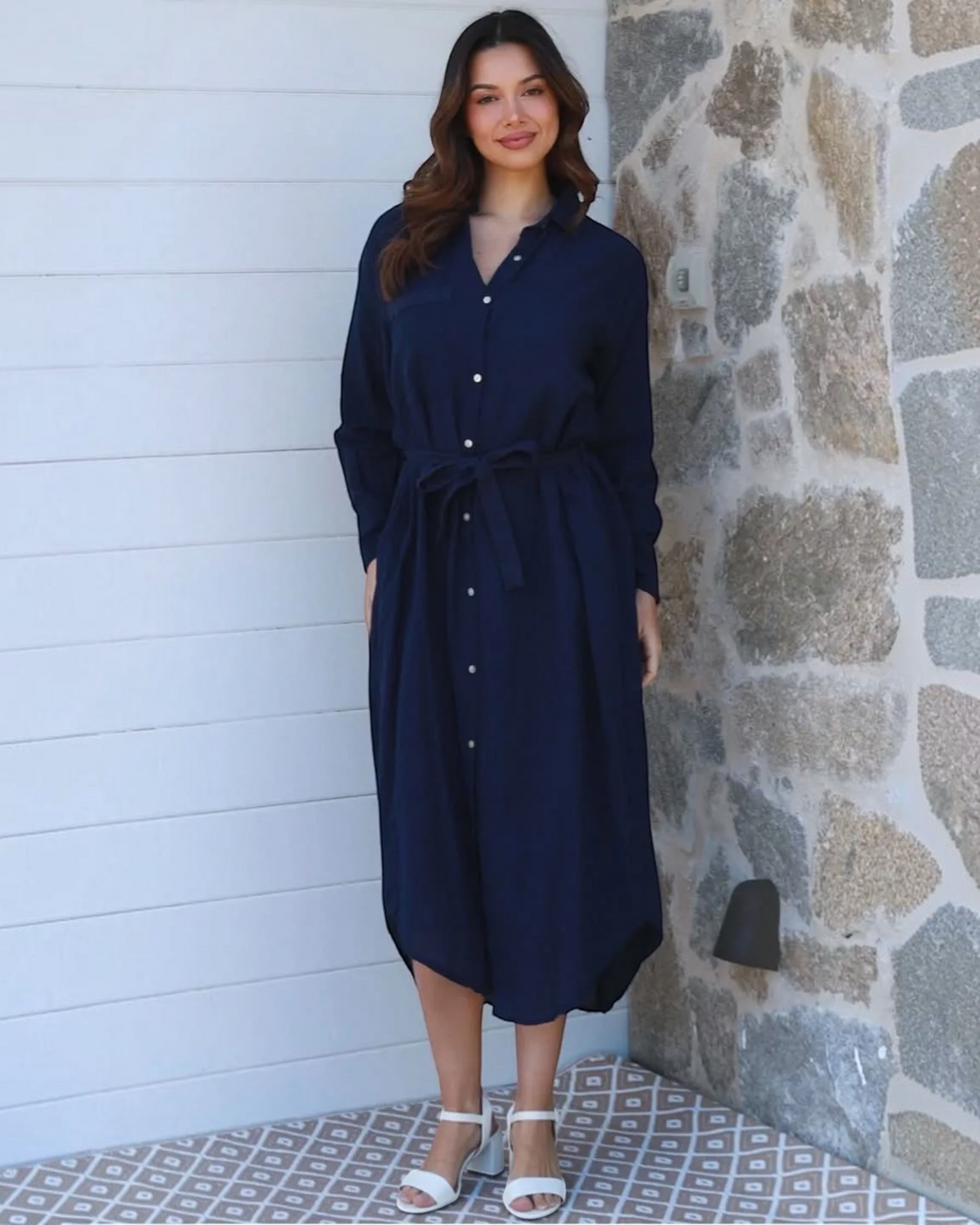 Model wearing a Thrift N Gift navy blue midi shirt dress with a collar, button-down front, and tie-waist belt.