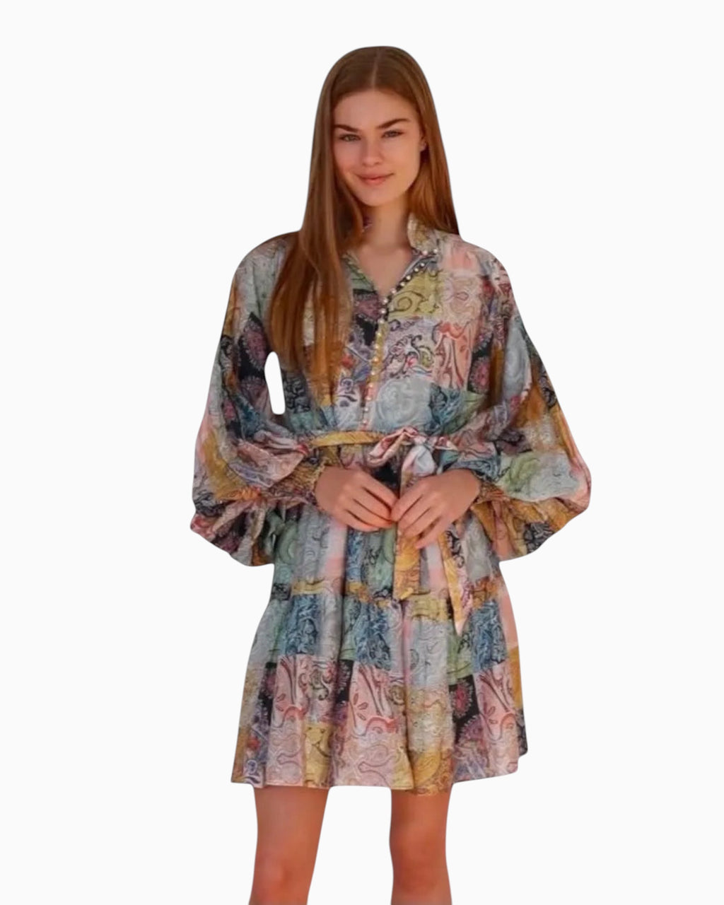 Model wearing a Thrift N Gift Charlotte The Label boho patchwork mini dress with balloon sleeves and a tie waist belt.
