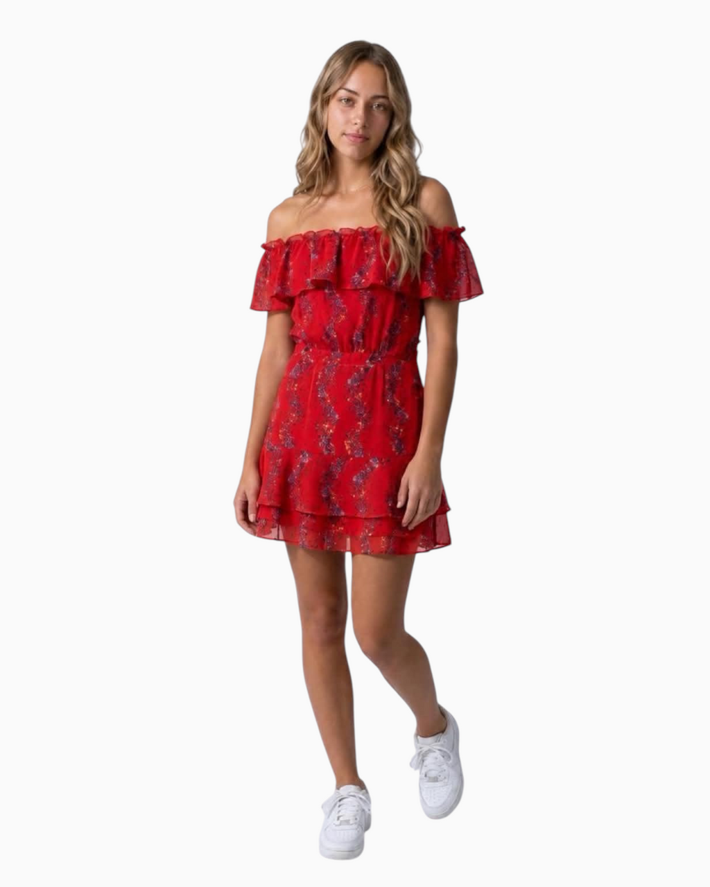 Model wearing a Thrift N Gift red floral off-the-shoulder mini dress with a ruffled neckline and tiered skirt.
